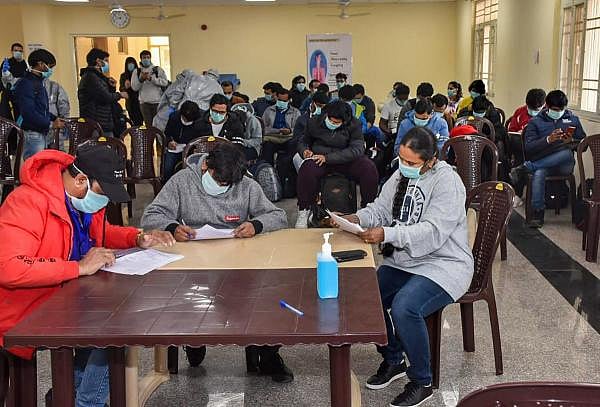 In this handout photo provided by ITBP, 112 evacuees including 36 foreign nationals who were air-lifted from Wuhan, China following out-break of the deadly novel coronavirus, being quarantined by the ITBP Quarantine Facility, at Chhawla Camp in New Delhi, Thursday, Feb. 27, 2020. (PTI Photo)