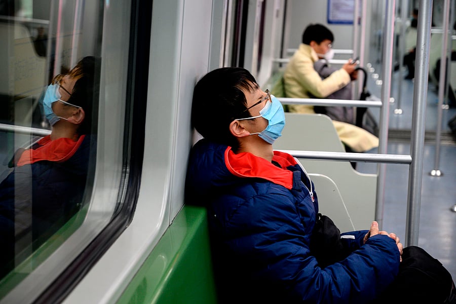 Zhang Hongxing, head of Wuhan's health commission, said last week the city tested about 6,000 to 8,000 people daily. (Credit: AFP Photo)