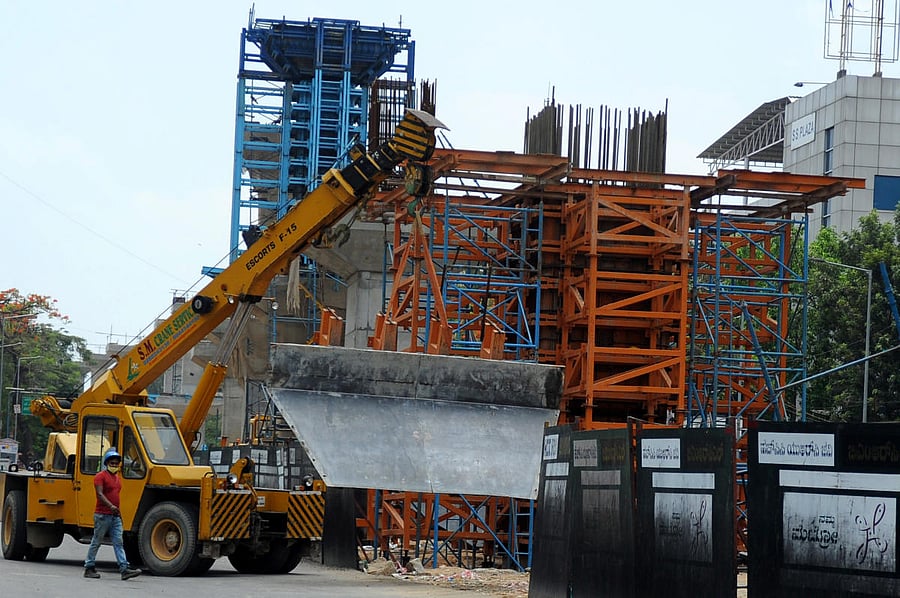 On-going metro work near Silk Board - BTM Layout, Bengaluru on Tuesday. DH Photo/ Pushkar V