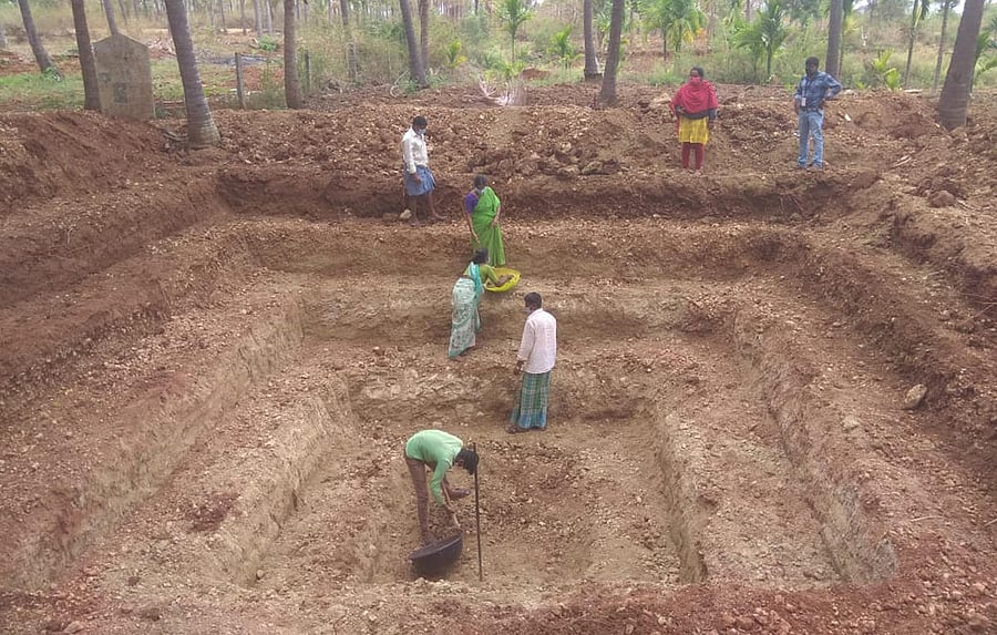 A ring tank being constructed in a farmland in Sringeri.