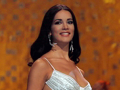 In this May 31, 2005 file photo, Monica Spear, Miss Venezuela 2005, competes at the Miss Universe competition in Bangkok, Thailand. Venezuelan authorities say the soap-opera actress and former Miss Venezuela and her husband were shot and killed resisting a robbery after their car broke down. Prosecutors said in a statement that Monica Spear and Henry Thomas Berry were slain late Monday, Jan. 6, 2013 near Puerto Cabello, Venezuela's main port. AP Photo