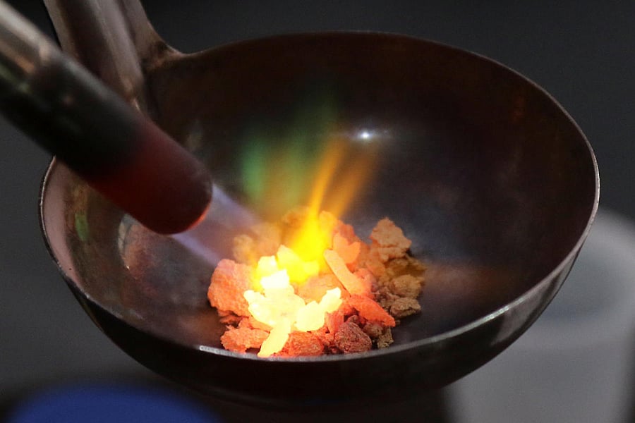 A man melts gold at his workshop in Puerto Ordaz, Venezuela August 7, 2018. Picture taken August 7, 2018. REUTERS.