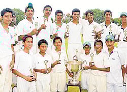 Players of St Josephs (State) High School with Dell- KSCA trophy in Mysore on Sunday. dh photo