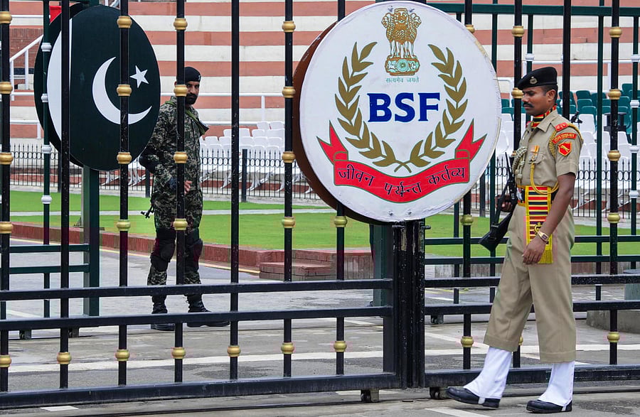 BSF and Pakistani Rangers soliders stand guard at Attari-Wagah international border. Credit: AFP Photo