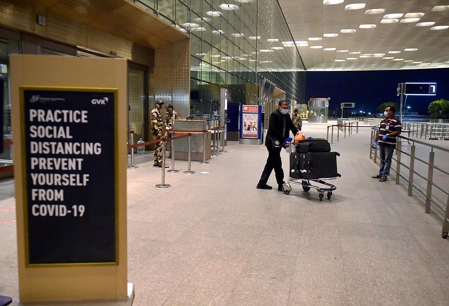 Passengers arrive to board the special Air India flight for London, from Mumbai Airport Terminal (PTI Photo)