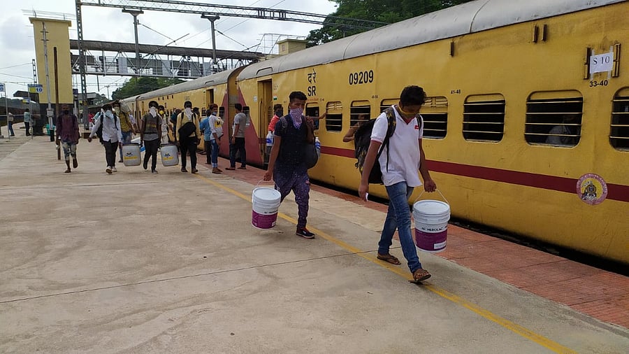 Labourers leaving for Uttar Pradesh from Mangaluru Junction Railway Station. (Credit: DH Photo/Govindraj Javali)