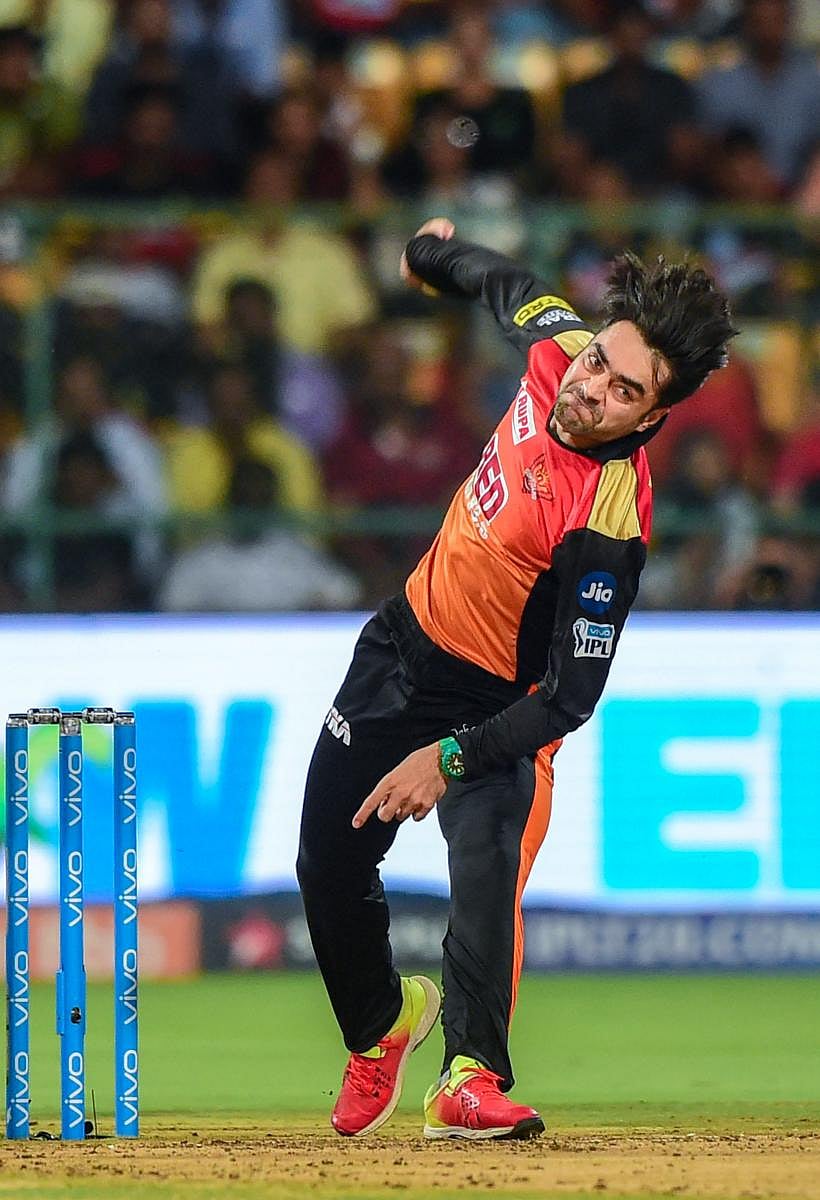 Bengaluru: Sunrisers Hyderabad's Rashid Khan bowls against Royal Challengers Bangalore during their IPL T20 cricket match 2018 at Chinnaswamy Stadium in Bengaluru on Thursday. (PTI Photo/Shailendra Bhojak) (PTI5_17_2018_000246b)