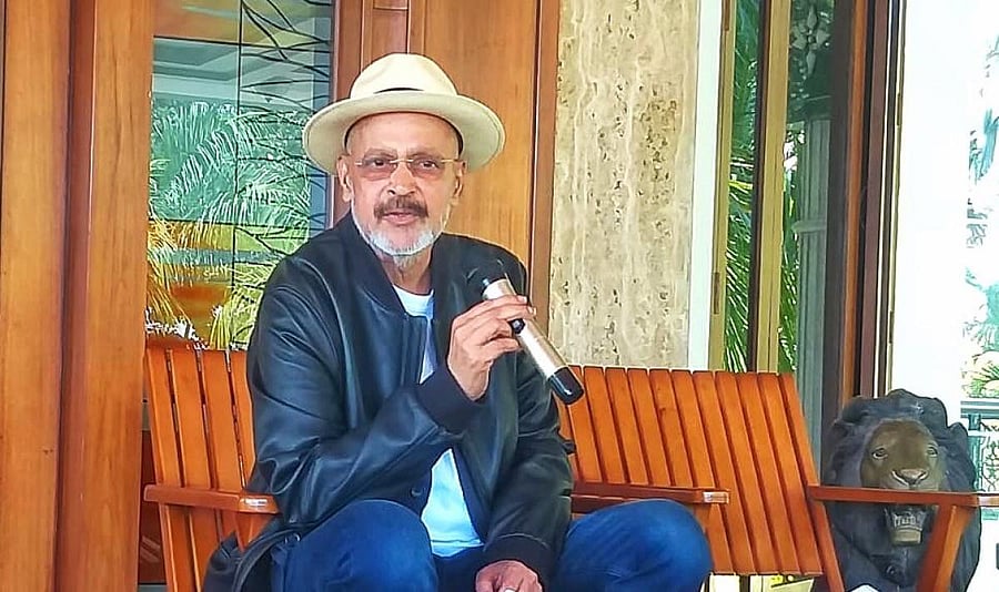Muthappa Rai cheers the media persons at a press conference in his house near Bidadi, on the outskirts of Bengaluru. 