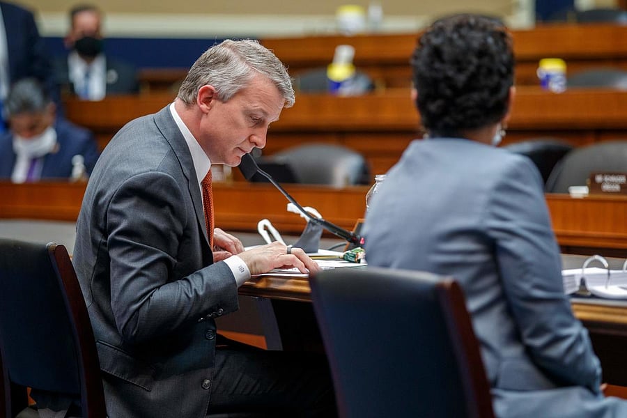 Dr. Rick Bright looks at his notes as he testifies before the House Energy and Commerce Subcommittee on Health. AFP