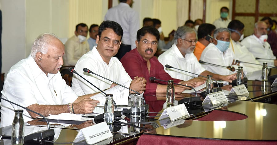 Chief Minister B S Yediyurappa chairs a meeting of all MLAs, MLCs and MPs from Bengaluru to discuss measures to tackle Covid-19 in the state, at the Vidhana Soudha, Benglauru on Saturday. Deputy Chief Minister C N Ashwath Narayan, Ministers R Ashoka, S Su
