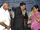 'Powerful Greetings: Chief Minister B S Yeddyurappa and Energy Minister Shobha Karandlaje greet Arup Roy Choudhury, Chairman and Managing Director, NTPC, in Bangalore on Thursday. DH Photo