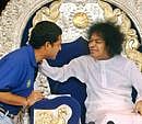 Sachin Tendulkar wit Sathya Sai Baba - AP File photo