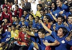 OVERJOYED: Indian footballers celebrate their triumph in the Nehru Cup final in New Delhi on Monday. India defeated Syria in the final. AFP