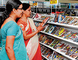 Of choices: Visitors browse through books at the newly-inaugurated Sapna Book House on Residency Road on Wednesday. DH Photo