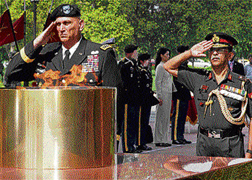 US Army chief General Raymond T Odierno pays tribute at Amar Jawan Jyoti at India Gate in New Delhi on Wednesday. PTI