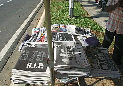 A white abalone sea snail is examined prior to a spawning event at the University of California's Davis Bodega Marine Laboratory.
