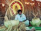 traditional art: An artist demonstrating the preparation of Prabhavali, the head gear for Bhoothakola on the last day of Vishwa Tulu Sammelana in Ujire on Sunday. dhphoto/ Chandrahas Kotekar