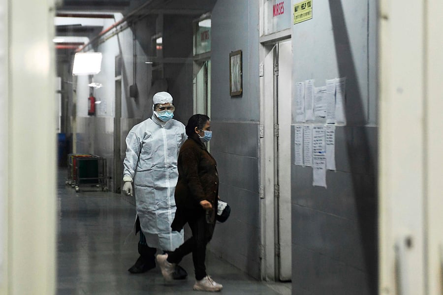 Members of medical staff are seen inside an isloation ward for COVID-19 coronavirus. (Credit: PTI)
