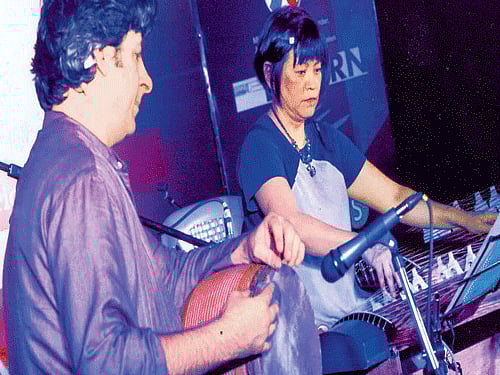 Tunji Beier and Satsuki Odamura perform at the World Music Festival.