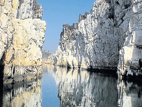 Marble rocks along the course of the calm Narmada river.