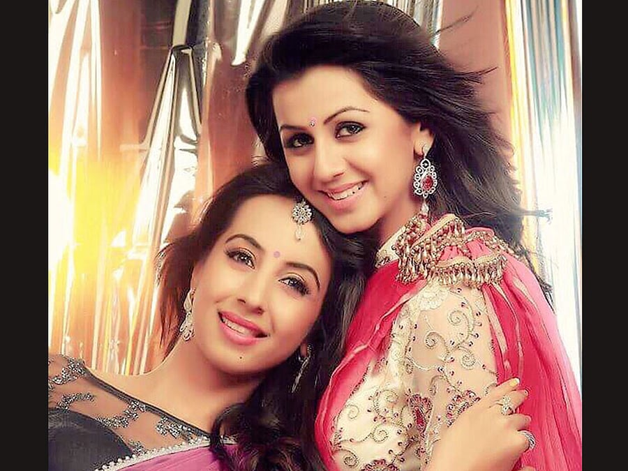 TOGETHER ALWAYS  Sanjjanaa and Nikki Galrani.