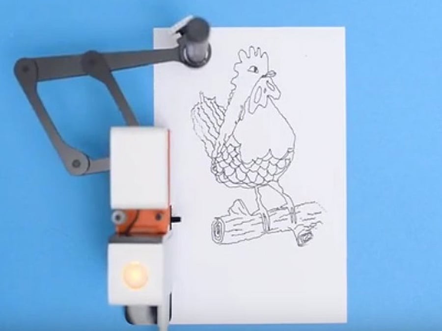 The robotic drawing arm, dubbed Line-us, was designed by a team of researchers, who combined their knowledge of kinetic art, drawing machines and internet-connected microprocessor chips to develop the idea. Screen grab.