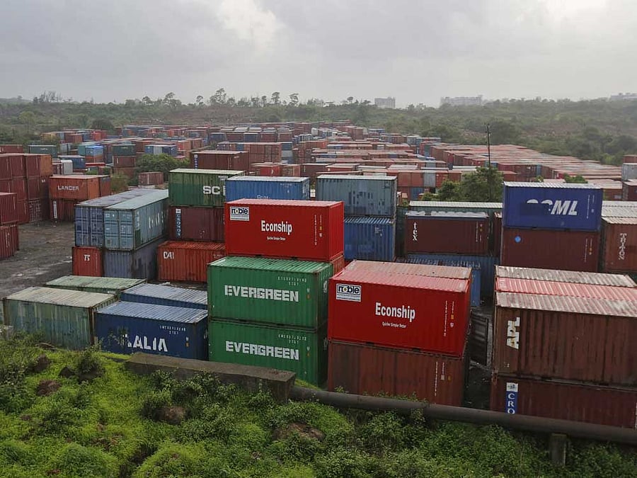 Cargo containers are seen stacked outside the container terminal of Jawaharlal Nehru Port Trust (JNPT) in Mumbai. Reuters file photo