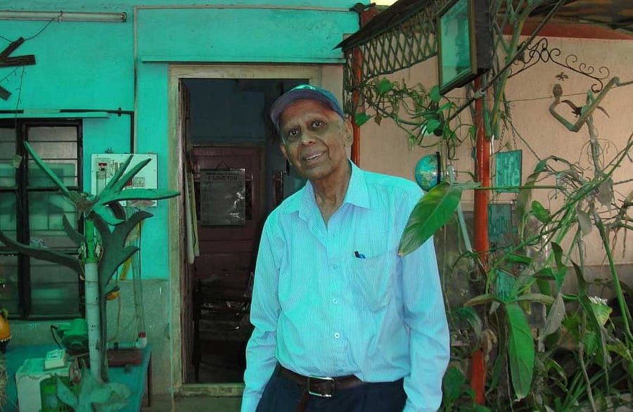 Creative: P D Ravindra uses machines like the portable traffic kit at his workshop to simplify complex science concepts for children. Photo by Author.