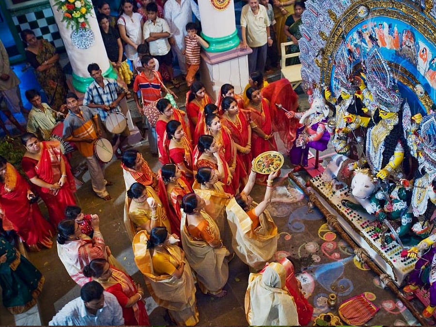 Apart from the taking part in the rituals and indulging in the festive finery, pujo also meant savouring the classic Bengali fish fry, plates of saffron-flavoured chicken biryani, tangy ghugni (dal curries) or rich mutton korma gravies at food stalls set up at the pandals.
