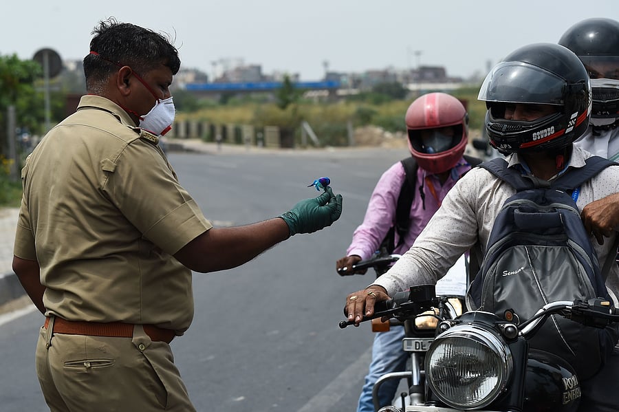 Only buses placed at the disposal of the police and health department will operate and the rest will be confined to depots, the chief secretary said in his order. (Credit: AFP Photo)