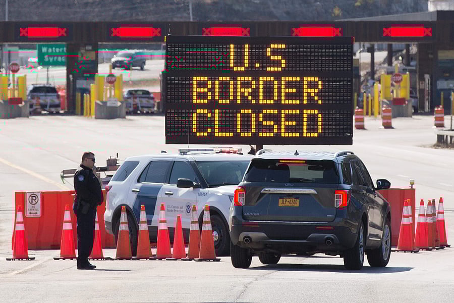 The border -- the world's longest international frontier at 8,900 kilometers (5,500 miles) -- was shut to all non-essential travelers on both sides on March 21 in response to the coronavirus crisis. (AFP)
