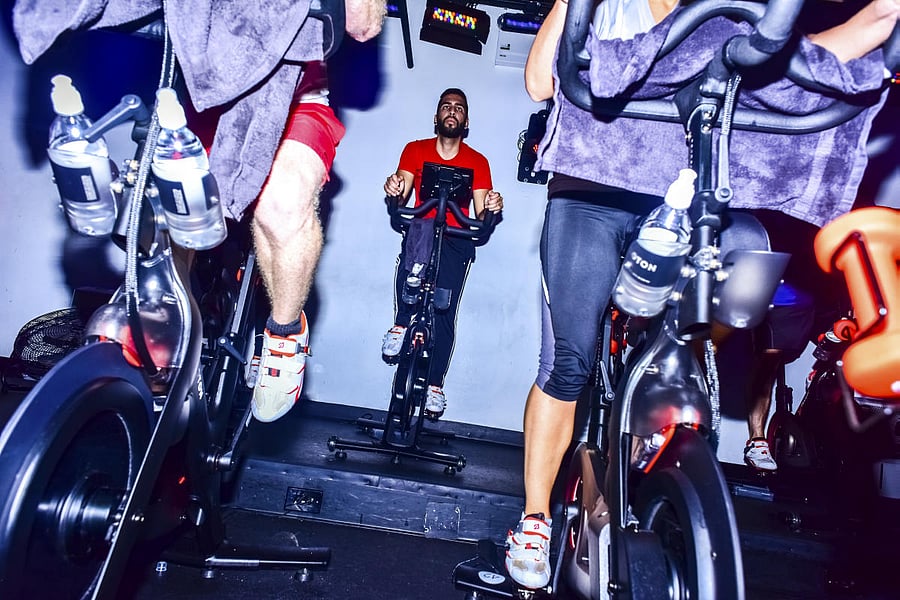 FILE-- A spin class inside Peloton's Manhattan studio, Sept. 8, 2016. Peloton, which sells an internet-connected spin bicycle, unveiled a $4,000 internet-connected treadmill in 2018. The company's insight: The gadget is not as important as the service. (Dolly Faibyshev/The New York Times)