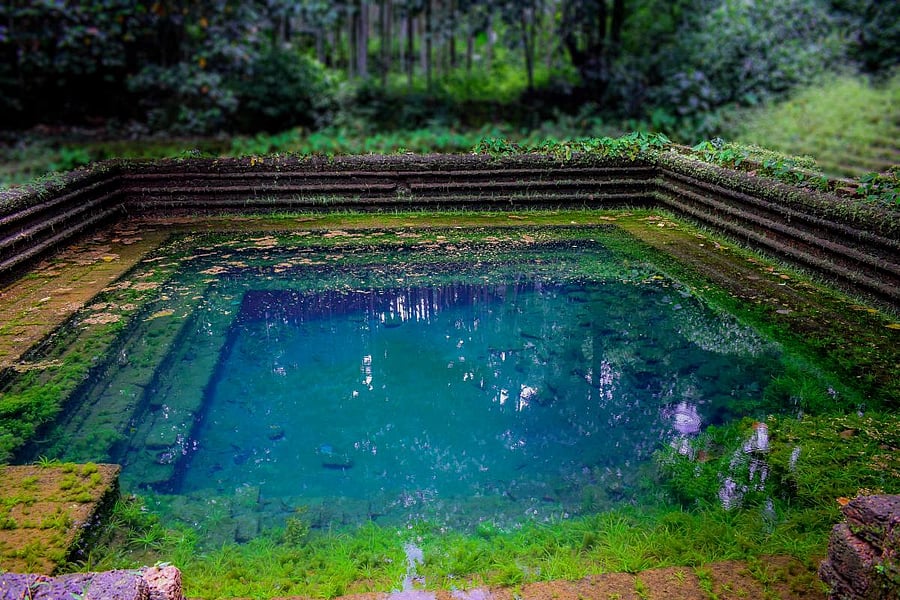 In order to enter the cave temple, devotees must take a bath at the pond beside the main temple, called the Nagappana Kere. PHOTO BY KRISHNA PRASHANT V