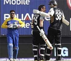 New Zealand's Nathan McCullum andTim Southee celebrate their thrilling victory against Sri Lanka in the opening match of Twenty20 Cricket World Cup in Georgetown on Friday. Ap