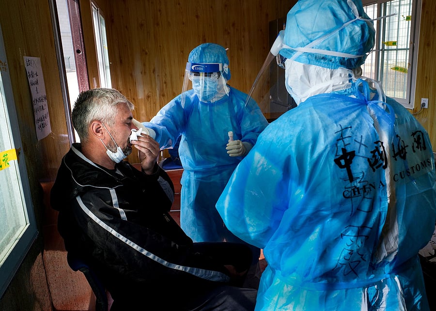The analysis states that, while downplaying the severity of the coronavirus, China increased imports and decreased exports of medical supplies. (Credit: AFP Photo)