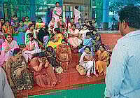 Worry: The retrenched employees of the Hassan Institute of Medical Sciences continuing their stir outside the college premises, in Hassan on Monday. Dh Photo