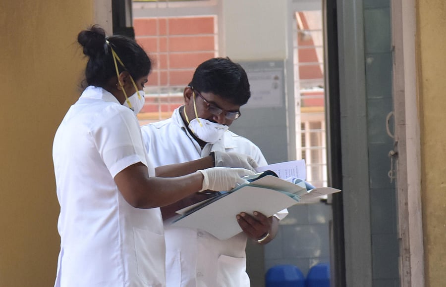 Staffs wear a mask due to the Coronavirus at a Rajivgandhi hospital in Bengaluru, Tuesday, March 3, 2020. Photo by Janardhan B K