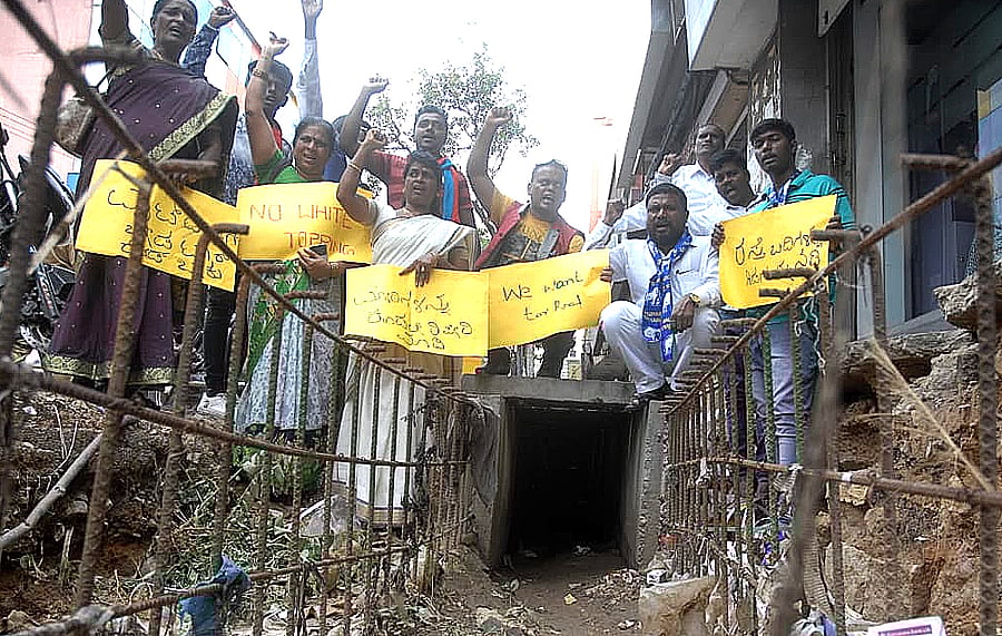 Residents of Wilson Garden protest on Tuesday against the BBMP's white-topping project.
