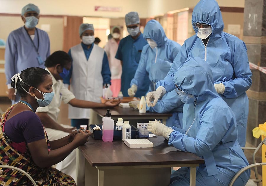 Medics take samples for rapid test (PTI Photo)