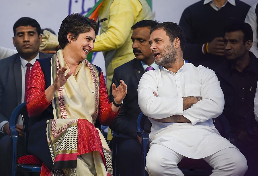 Congress leader Rahul Gandhi and party General Secretary Priyanka Gandhi Vadra during an election campaign rally in support of party candidate from Sangam Vihar constituency Poonam Azad (unseen), ahead of the State Assembly polls, at Sangam Vihar in New Delhi. PTI