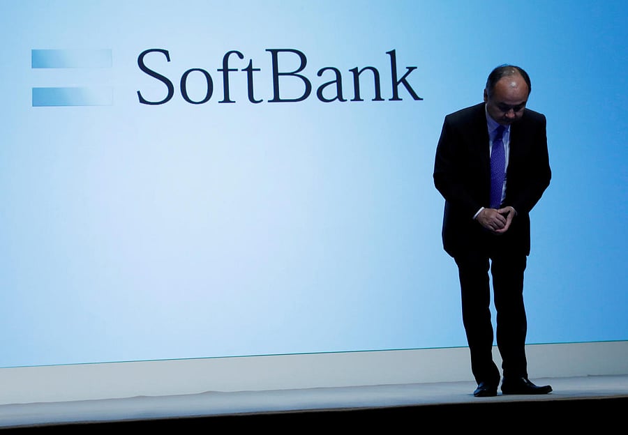 Japan's SoftBank Group Corp Chief Executive Masayoshi Son bows his head after his presentation at a news conference in Tokyo. Reuters/File