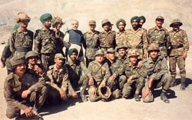 In the photographs, he is seen interacting with army men and meeting wounded soldiers.