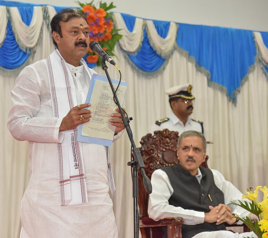 Narayan Gowda, Krishnarajapet (KR Pet), newly elected in bye election, taking oath as Legislator to the State Legislative Assembly in Banquet Hall, Vidhana Soudha, Bengaluru on Sunday. Photo by S K Dinesh