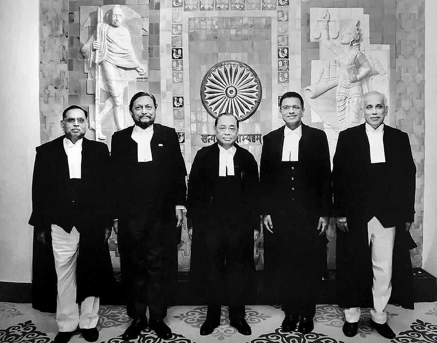 A group photo of the five-judge bench comprised of Chief Justice of India Ranjan Gogoi (C) flanked by (L-R) Justice Ashok Bhushan, Justice Sharad Arvind Bobde, Justice Dhananjaya Y Chandrachud, Justice S Abdul Nazeer after delivering the verdict on Ayodhya land case, at Supreme Court in New Delhi. (PTI Photo)