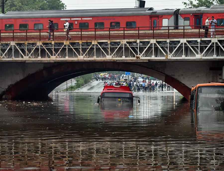 Water Logging after heavy monsoon rain at Minto Bridge in Connaught Place in New Delhi, on Friday. PTI Photo