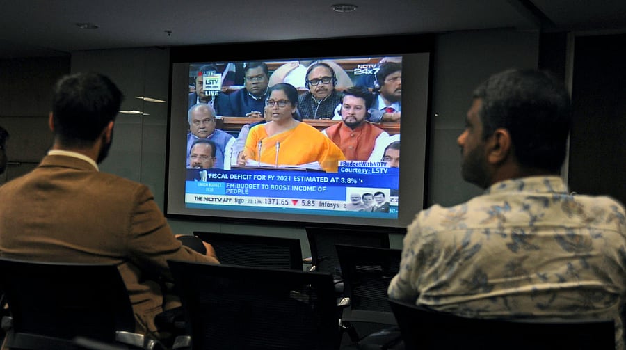 People watch the Union Budget 2020 at World Trade Center at a budget event organised by FICCI and World Trade Center in Bengaluru on Saturday. | DH Photo: Pushkar V