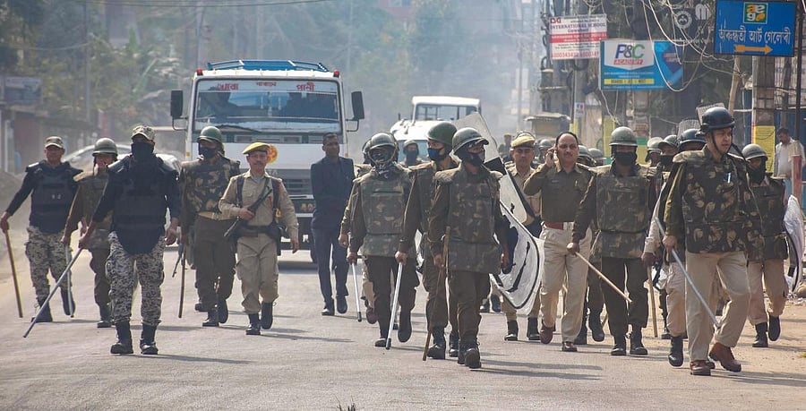 Security personnel patrol a street during curfew, a day after unrest against the Citizenship Amendment Bill, in Guwahati. PTI
