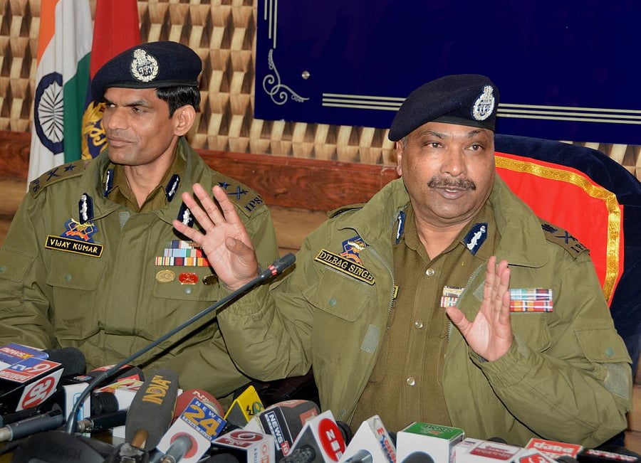 Director General of Jammu and Kashmir Police Dilbagh Singh (R) along with Inspector General of J&K Police Vijay Kumar addresses a press conference regarding the killing of top three Hizbul Mujahideen Commanders in Tral encounter, in Srinagar, Wednesday, Feb. 19, 2020. (PTI photo)