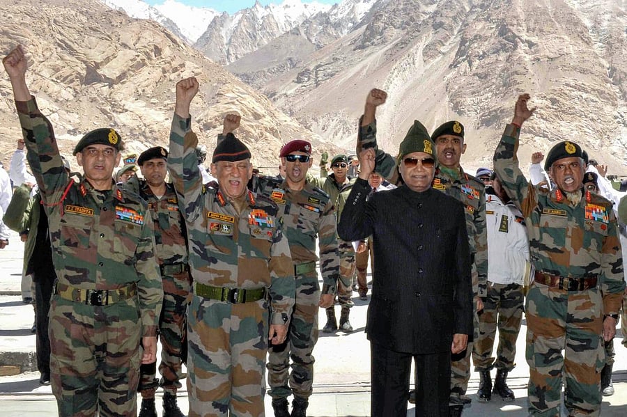 President Ram Nath Kovind with the soldiers at Siachen Base Camp on Thursday. PTI