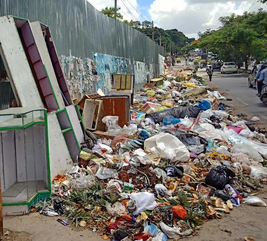 Garbage dumped along 100 Feet Ring Road in Banashankari, from the Kadirenahalli underpass to the JP Nagar metro station.